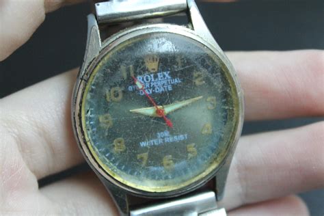 rolex oyster perpetual day date 30m water resist price